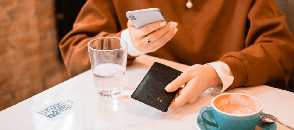 Walli smart wallet buzzes your phone if you leave it or your cards